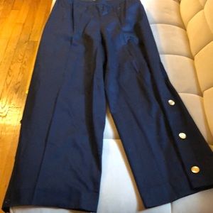 Vintage Chanel Navy pull on pant with 4 gold Chanel button trim on each leg.